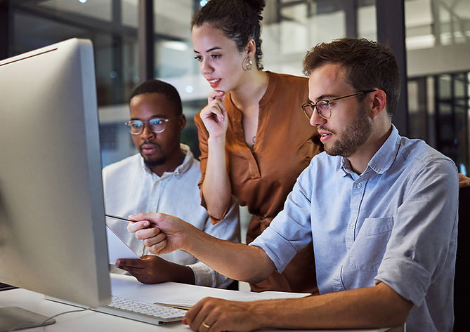 Business team collaborating on a computer